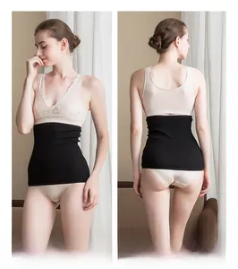 Close-up of black seamless wool waist warmer showing ribbed texture and snug fit