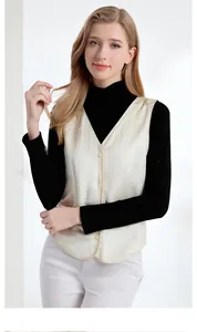 Detail showing 100% mulberry silk filling and satin texture of this warm women's vest