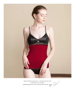 Detail showing red ribbed knit 100% fine wool waist warmer on female model