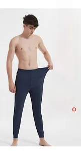 Detailed view of men's thermal leggings featuring high elastic spandex for a snug fit
