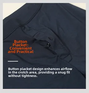Detail of blue men silk thermal pants featuring a functional button fly and fine stitching
