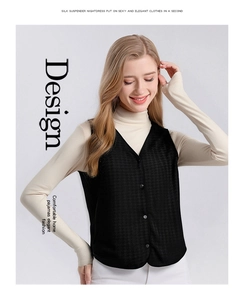 Detail of black jacquard silk vest with V-neck and button closure in oriental style