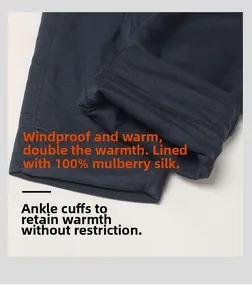 Detail view of the 100% silk filling and ribbed ankle cuffs on navy thermal pants