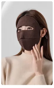 Detail of wool thermal mask with 100% silk lining showing fabric layers and UPF50+ protection