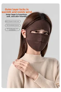 Detail of silk face mask showing windproof lock-temperature tech and soft skin-care texture