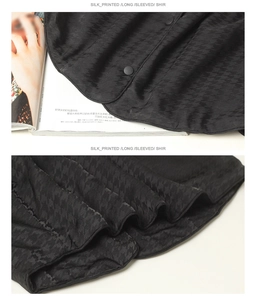 Detailed view of black silk printed shirt with houndstooth texture and silk sheen