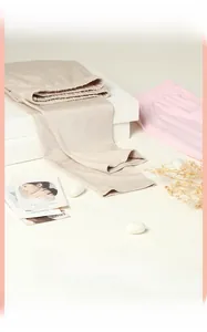 Detail view of lightweight thermal silk pants showing soft fabric texture and elastic waistband