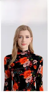 Close-up detail of high collar design and vibrant floral print on wool sweater