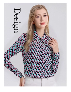 Detail view of colorful geometric chain print and button-down collar on silk shirt