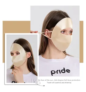 Detailed texture of 22mm champagne mulberry silk sun protection mask with adjustable straps