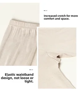 Detailed view of high elastic waistband and wide crotch on silk thermal pants