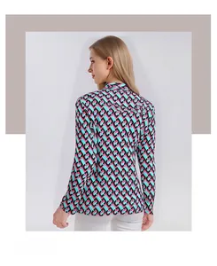 Detailed back view of long-sleeve silk shirt with geometric chain print and high collar