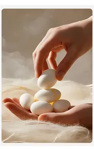 Detailed view of natural white silk cocoons and raw silk fibers for thermal leggings