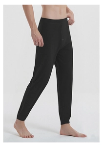 Detail view of men's thermal leggings featuring 100% silk filling and a wide elastic waistband