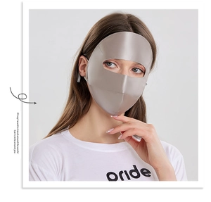 Macro detail of high-quality 22mm silk sun mask fabric with smooth silver-grey finish