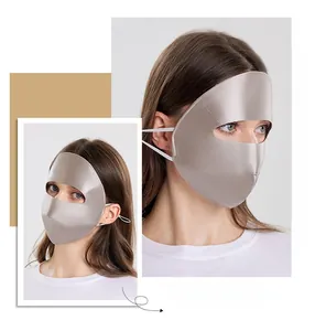Detailed view of 100% mulberry silk sun mask with full face coverage in champagne silk