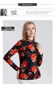 Detailed view of women high collar fine wool shirt with orange floral print and silk finish
