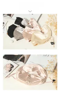 Detail view of adjustable silk sun masks in various colors with a soft satin luster