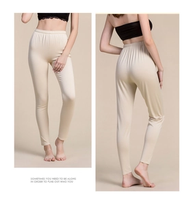 Detailed front and back views of women's silk thermal leggings with high elastic waist