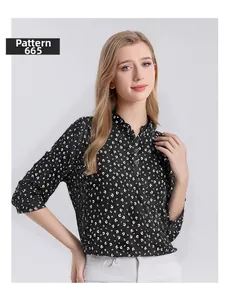 Detail of ruffle stand-up collar and crescent moon print on silk long sleeve shirt