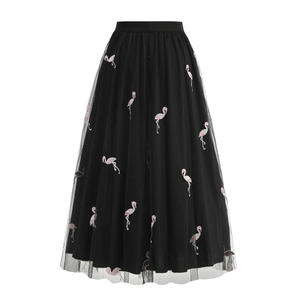 Close-up detail of flamingo embroidery on black mesh tulle high-waisted A-line skirt