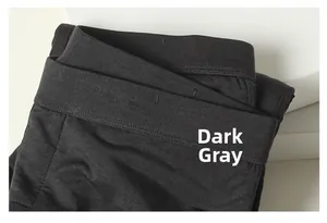 Detail of dark grey thermal pants made of 100% mulberry silk with fine knit texture