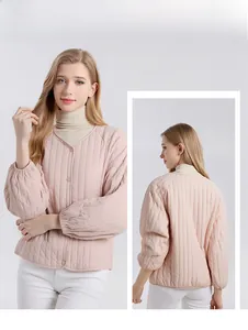 Front and back view of a light pink quilted silk jacket with a button-up V-neck design