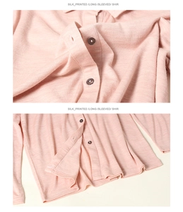 Détail d'une chemise en laine rose avec col classique et boutons foncés élégants