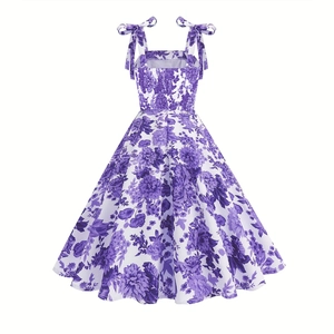 Detail of smocking elastic back and tie shoulder straps on purple floral maxi dress