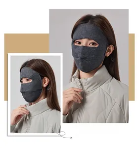 Close-up of dark grey wool and silk face mask with adjustable ear loops for winter