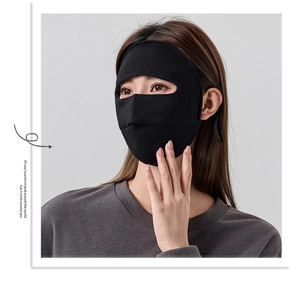 Detailed close-up of a black full-face thermal wool mask for outdoor windproof protection