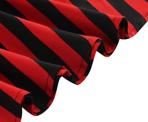 Detailed macro view showing the red and black striped fabric hem and fine sewing craftsmanship
