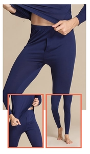 Dettaglio dei leggings termici in lana blu navy con elastico in vita e trama del tessuto