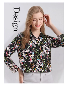 Close-up of silk floral shirt with lapel collar and detailed colorful print patterns