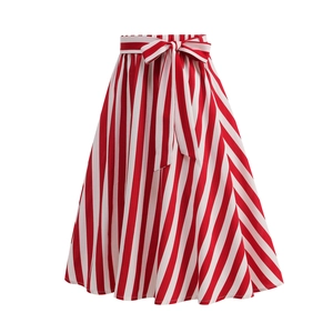 Detail view of high-waist A-line skirt featuring red and white vertical stripes and bow belt