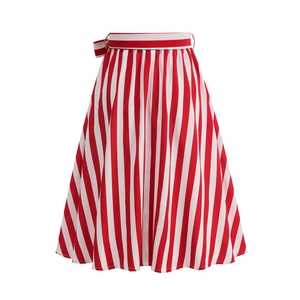 Detail of red and white striped A-line skirt featuring high waist and side tie bow knot