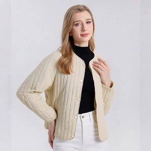 Women's V-neck silk filled quilted jacket in cream beige with vertical stitching