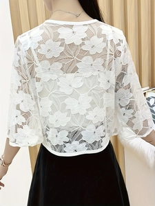 Elegant white lace shrug with floral crochet pattern and three-quarter sleeves