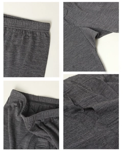 Vista dettagliata dei leggings in lana grigia con vita elastica e cuciture rinforzate