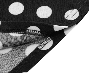 Detailed close-up showing the high-quality double-stitched hem and white polka dots pattern