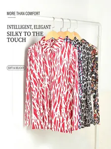 Women's silk long-sleeved shirt with abstract prints and a turn-down collar style