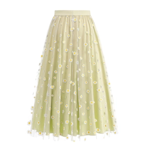 Pastel green tulle midi skirt with daisy embroidery and elastic high waist design