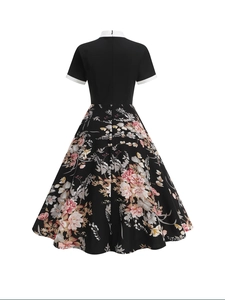 Vintage 50s floral print A-line dress with black bodice and white lapel collar