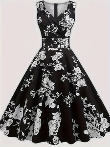 Close-up of vintage black dress featuring white floral print and elegant V-neck design
