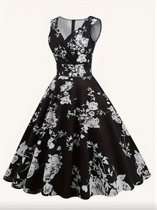 Close-up detail of vintage floral print and cross V-neck on sleeveless A-line dress