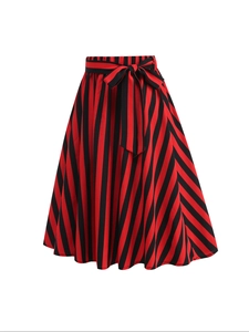 Vintage A-line midi skirt featuring red and black vertical stripes with a waist tie