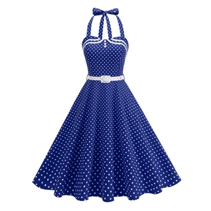 Retro halter-neck A-line dress in navy blue with white polka dots and belted waist