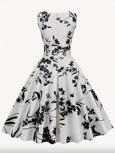 Detail view showing the concealed back zipper on this vintage floral A-line sleeveless dress