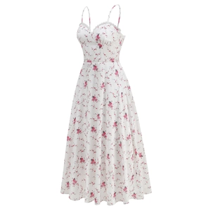 Close-up of lace V-neckline and delicate floral embroidery on white summer dress