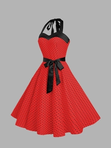 Détail de la robe rouge à pois rétro des années 50 avec licou et ceinture en satinée noire
